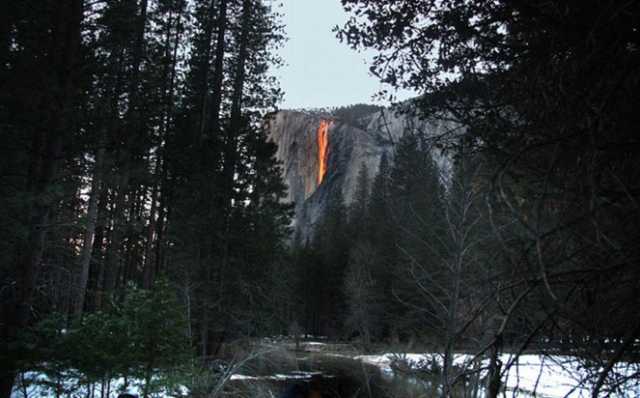 sun gives an beutiful foton in waterfalls in Yosemite california